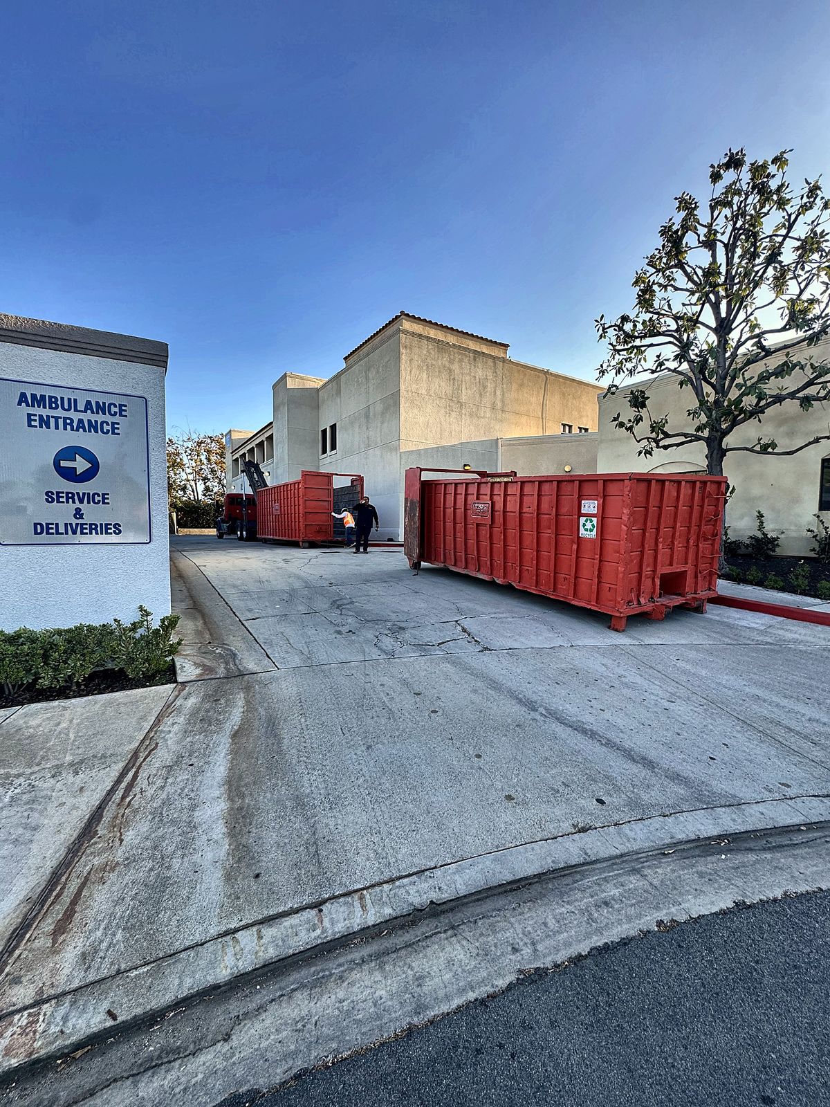 A2Z 40 yard roll off containers placed at a hospital service entrance